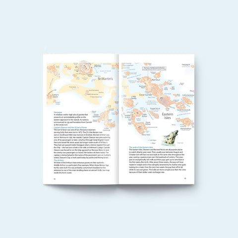 Friendly Guides Isles of Scilly guidebook showing inside pages with maps of the Eastern isles, Hanjague and text about the wreck of the SS Earl of Arran map