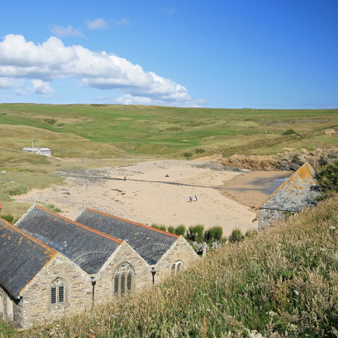 Photo from Friendly Guides Lizard Guidebook of Gunwalloe Church and Church Cove Beach in West Cornwall