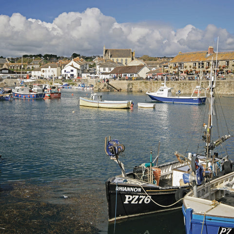 Photo from Friendly Guides Lizard Guidebook of boats in Porthleven Harbour, West Cornwall