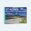 The cover of the St Agnes book looking over the sand bar between Gugh and St Agnes. Marram grass in the foreground and blue sky with clouds. A kite surfer is in the middle distance.