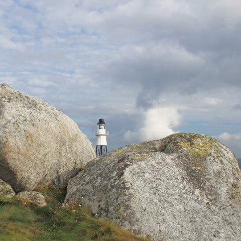 Photo from Friendly Guides Isles of Scilly Guidebook showing Peninnis Head Lighthouse on St Mary's, Isles of Scilly