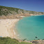 Photo from Friendly Guides Lands End Guidebook showing Porthcurno Beach and Treen (Pedn Vounder) beaches in West Cornwall
